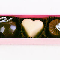 The Pink Fabulous 5 Piece Box of All kinds of chocolates features the following flavours: White Chocolate Caramel, Blood Orange, Milk Chocolate Caramel, Chocolate Lime, By Christopher Norman Chocolates